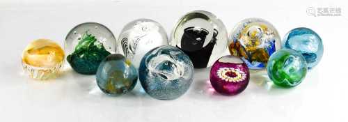 A group of eight Caithness and other paperweights, of variou...