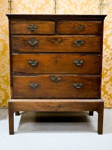 An 18th century oak chest on stand, comprising two over thre...