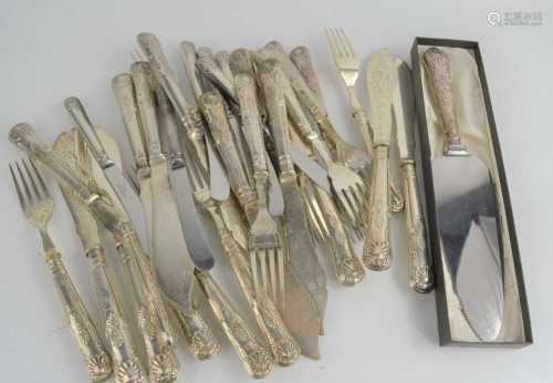 A group of silver handled cutlery