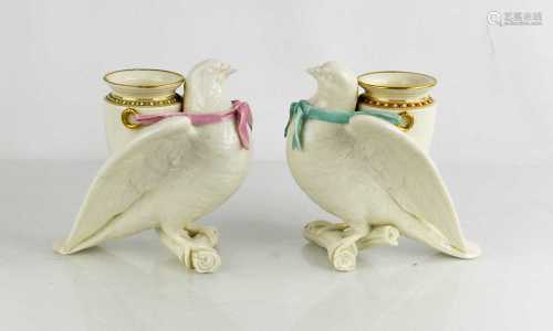 A pair of Royal Worcester porcelain spill vases, modelled as...