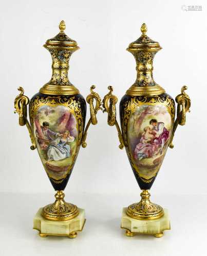 A pair of fine French porcelain and ormolu urns, the bodies ...
