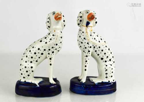 A pair of 19th century Staffordshire dogs, 19cm high.