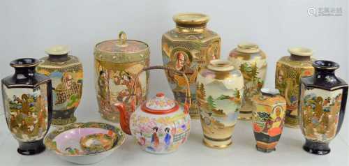 A group of Japanese Satsuma ware to include vases, tea caddy...