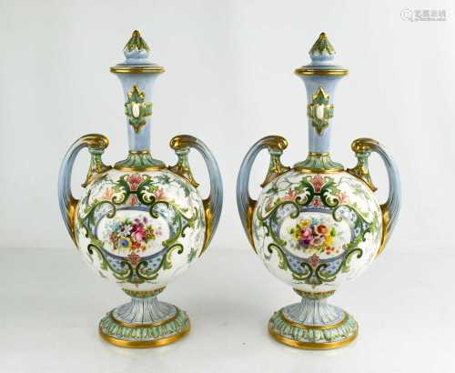 A pair of Royal Worcester vase and covers, circa 1902, of ov...