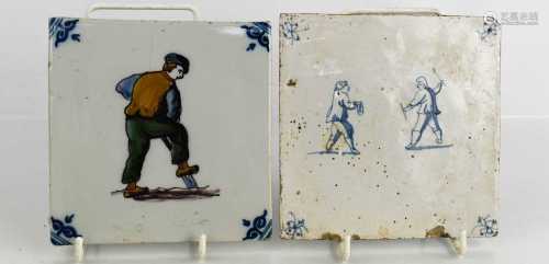 An early 19th century Delft blue and white tile, together wi...
