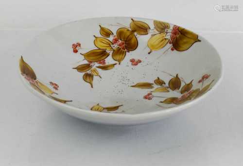 A 20th century Chinese bowl, bearing red calligraphy marks t...