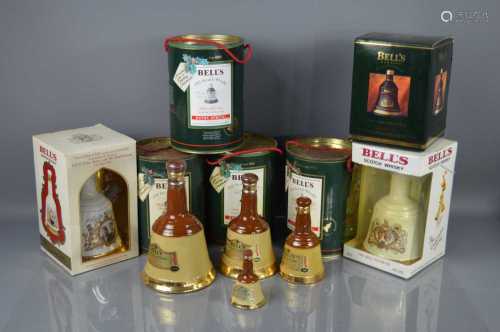 A group of five Bell's Whisky decanters, all full and sealed...