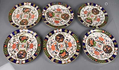 Twelve Royal Crown Derby plates, six 26cm diameter, six 22cm...