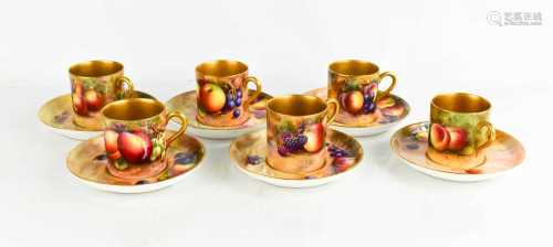 A set of six Royal Worcester coffee cans and saucers, painte...