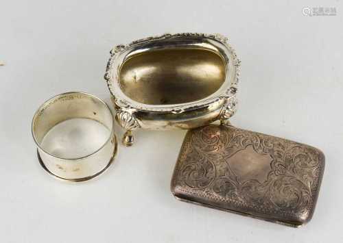 A silver vesta case, engraved with scrollwork, a silver salt...