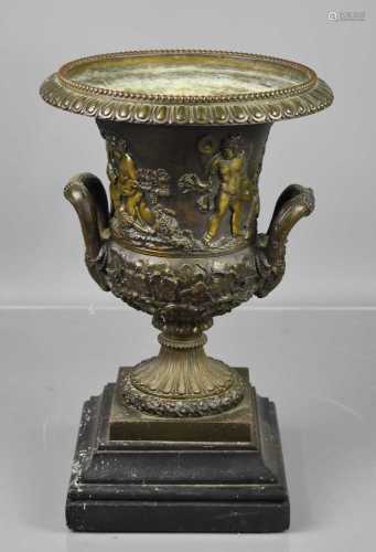 A classical style bronze urn jardiniere, of flared form, the...