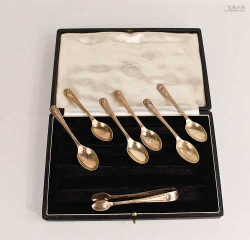 A set of silver teaspoons, and a silver pair of sugar tongs,...