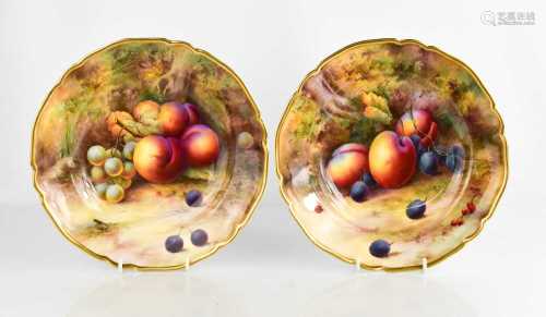 A fine pair of Royal Worcester bowls by Horace Price, painte...