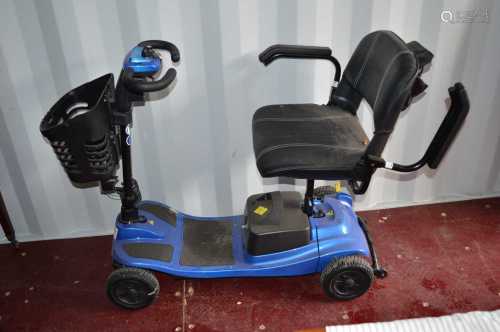 A blue mobility scooter with keys and lead