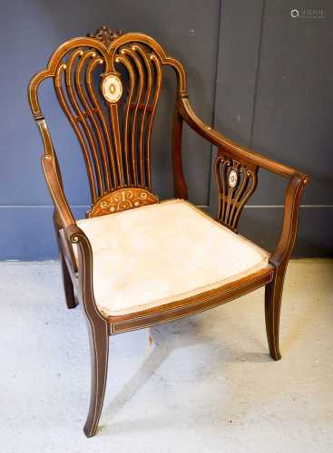 A 19th century inlaud rosewood salon chair, with curved spin...