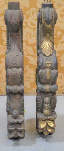 Two antique carved console legs, with some residual gilding,...
