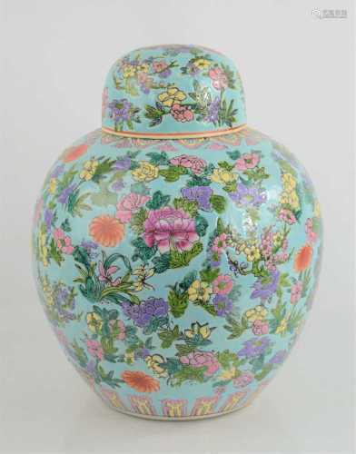 A Chinese porcelain ginger jar and cover decorated in a fami...