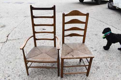 A 19th century elm ladder back armchair and a hall chair, bo...