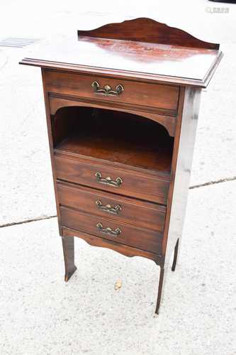 An Edwardian mahogany music cabinet