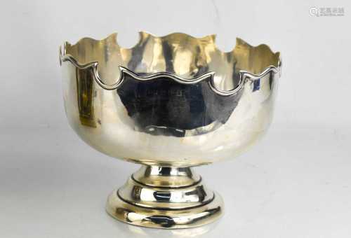 A silver bowl, with shaped rim, Birmingham 1909, with a lead...