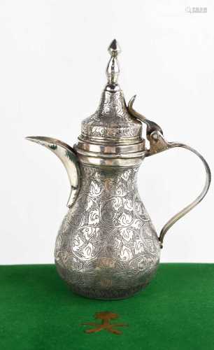 An Indonesian silver teapot, of baluster shape, stamped 925,...