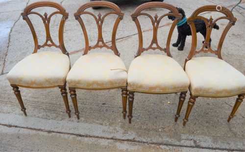 A set of four bedroom chairs with upholstered seats