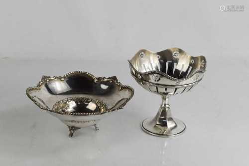A silver bon bon dish, with embossed edge and three feet, an...