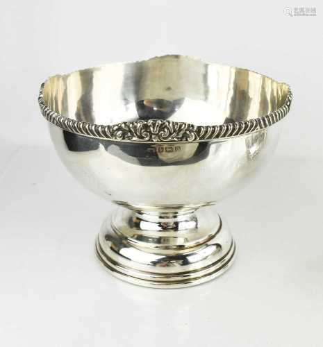 A George V silver rose bowl with a scroll and shell decorati...