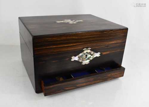 A Victorian coromandel dressing table box with mirrored inte...