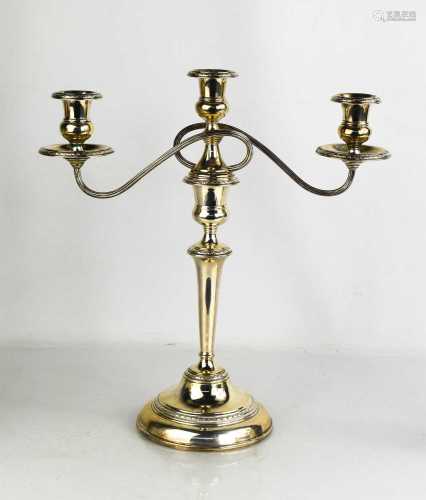 A silver candleabra, with three branches and weighted base, ...