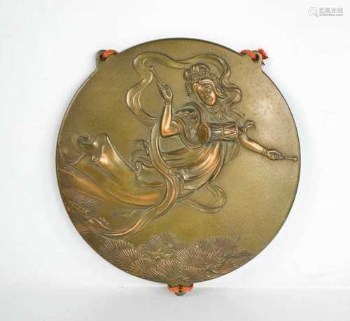 A Chinese bronze roundel plaque depicting female figure circ...