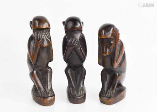 A set of three hardwood carved monkeys, 'See No Evil, Hear N...