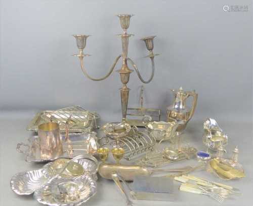 A group of silver plated items, including two sauce boats wi...