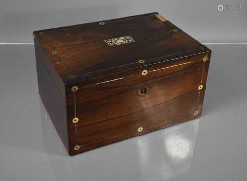 A 19th century rosewood vanity box, with fitted interior and...