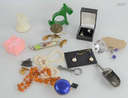 A group of collectibles to include a silver and enamel brooc...