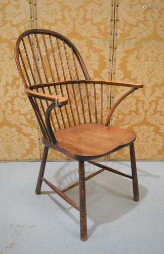 A 19th century windsor chair with spindle back, and stretche...
