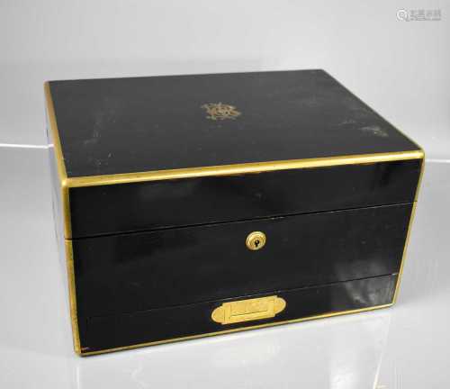 A Victorian dressing table box, the ebonised brass bound box...