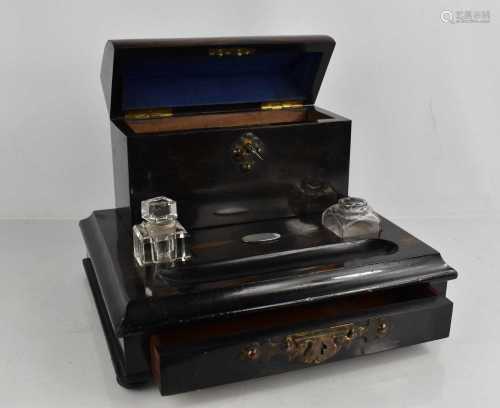 A 19th century coromandel stationary stand, with inkwell, th...