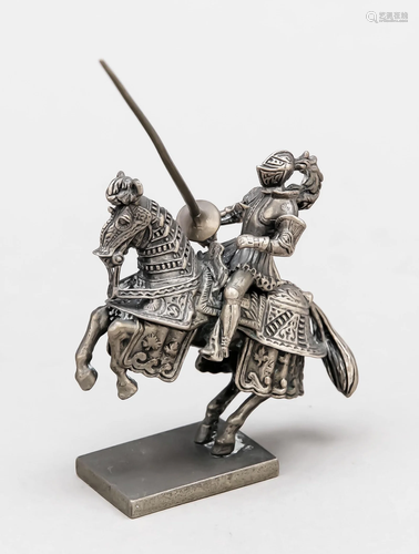 Miniature knight on horseback