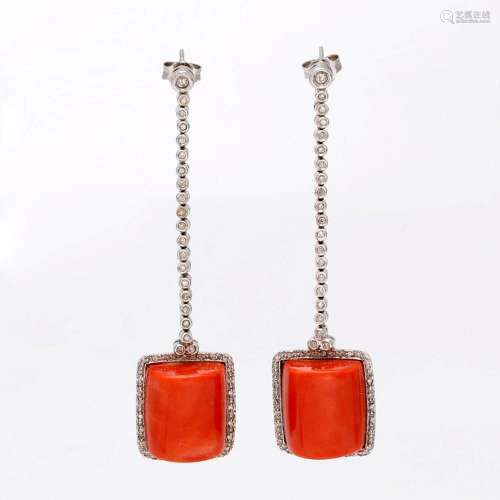 Diamonds and coral long earrings.