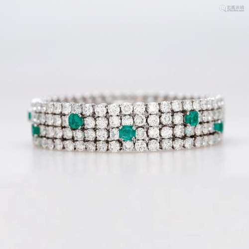 Diamonds and emeralds wide bracelet.