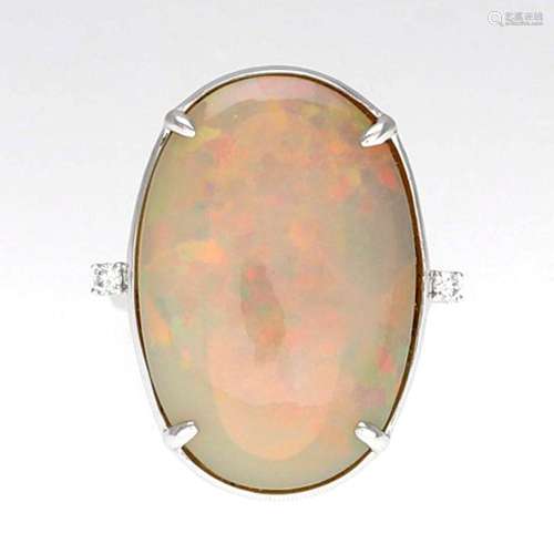 Opal and diamonds ring.