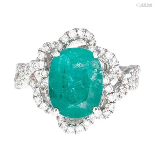 Emerald and diamonds ring.