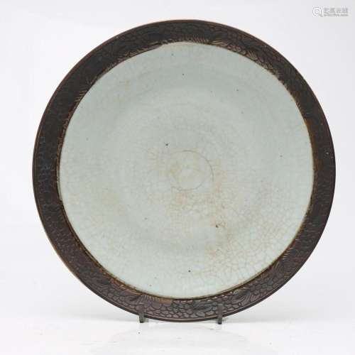 Chinese dish in celadon porcelain, 20th Century.