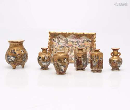 Six miniature Japanese Meiji vases and a tray, in Satsuma ea...