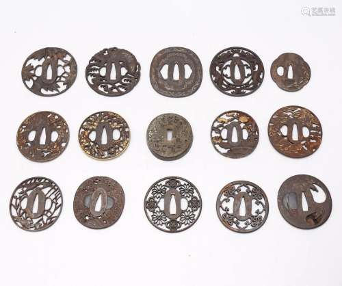 Fifteen Japanese Edo "tsuba" in iron, 18th and 19t...