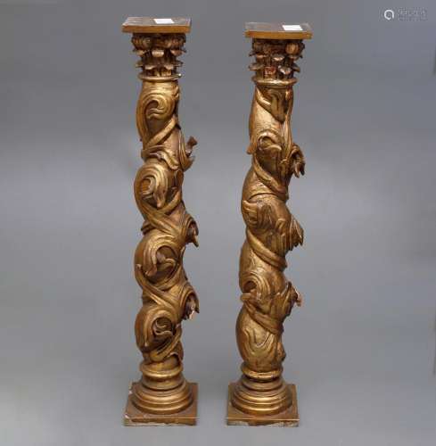 Pair of Solomonic columns in carved and gilded wood, 17th an...