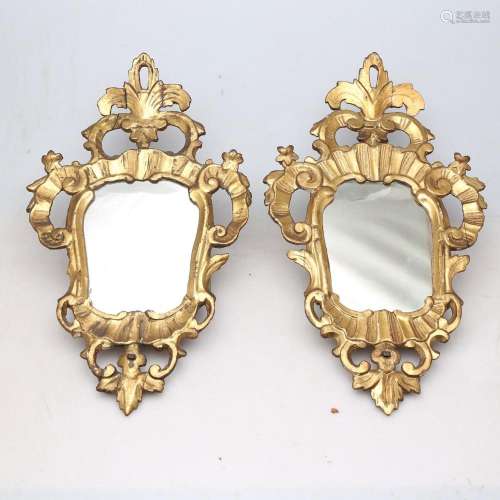 Pair of Spanish ornamental mirrors with carved and gilded wo...