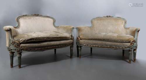 Pair of Louis XVI style “en corbeille” sofas in carved, poly...