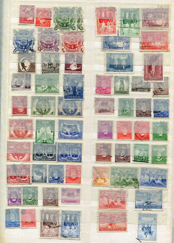 A collection of world used stamps in twenty stock books, inc...